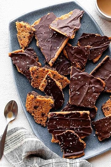 chocolate chip cookie bark with chocolate and sea salt on top pictured on blue plate.