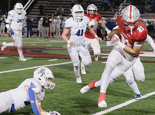 Camel’s Ashton Rees fights for yardage in the second half...