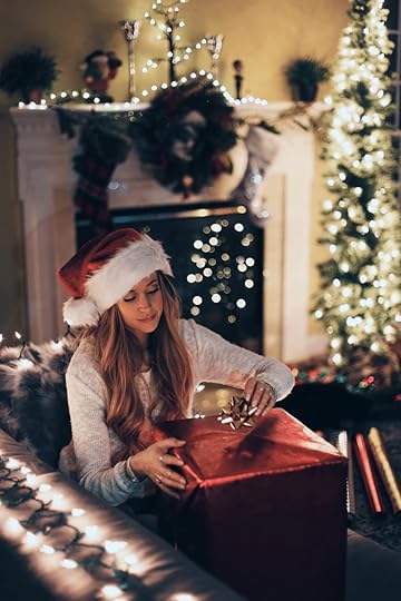 woman opening gifts
