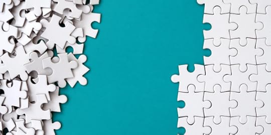 Jigsaw puzzle pieces, half assembled