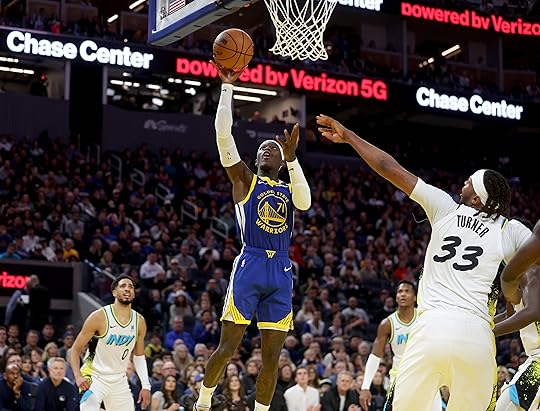 Golden State Warriors’ Dennis Schroder shoots a layup past Indiana...