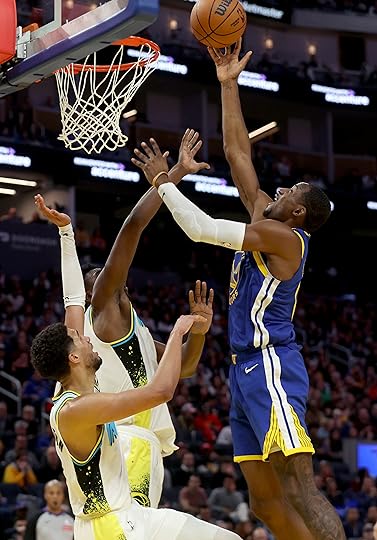 Golden State Warriors’ Jonathan Kuminga #00 puts up a shot...