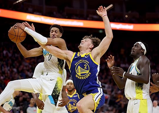 Golden State Warriors’ Brandin Podziemski #2 battles Indiana Pacers’ Tyrese...