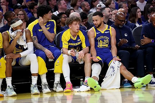 Golden State Warriors’ Stephen Curry #30 talks to teammate Brandin...