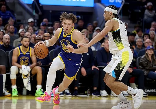 Golden State Warriors’ Brandin Podziemski #2 brings the ball downcourt...