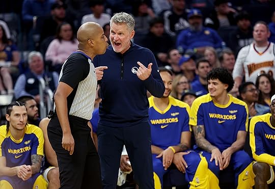 Golden State Warriors head coach Steve Kerr disputes a call...