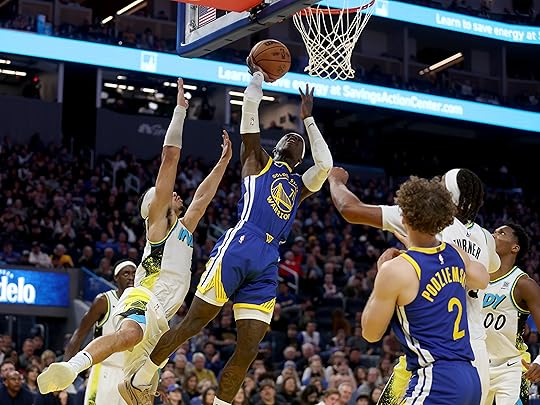 Golden State Warriors’ Dennis Schroder shoots a layup past Indiana...