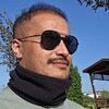 Headshot of Reza Taheri