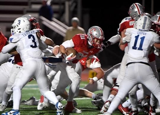 Carmel High's Ashton Rees (21) runs the ball in for a touchdown in the fourth quarter of their CIF NorCal Division 5-AA title football game against Acalanes High at Monterey Peninsula College. (Doug Duran/Bay Area News Group)