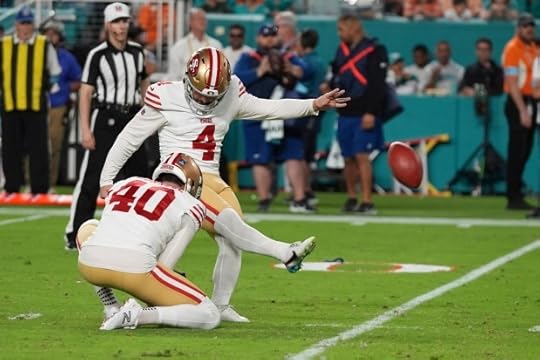 San Francisco 49ers place kicker Jake Moody (4) kicks a field goal during the first half of an NFL football game against the Miami Dolphins, Sunday, Dec. 22, 2024, in Miami Gardens, Fla. (AP Photo/Lynne Sladky)