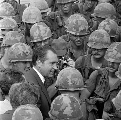 President Richard Nixon with U.S. soldiers assigned to the 1st Infantry Division in South Vietnam in 1969. Photo courtesy of the U.S. National Archives.