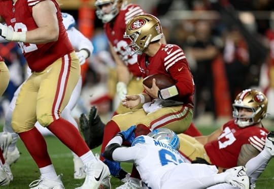 San Francisco 49ers quarterback Brock Purdy #13 is sacked by Detroit Lions' Al-Quadin Muhammad #69 in the fourth quarter of their NFL game at Levis Stadium in Santa Clara, Calif., on Monday, Dec. 30, 2024. (Jane Tyska/Bay Area News Group)