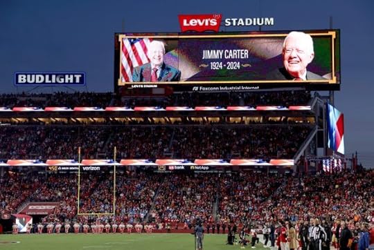 A tribute to former President Jimmy Carter before the San Francisco 49ers NFL game against the Detroit Lions at Levis Stadium in Santa Clara, Calif., on Monday, Dec. 30, 2024. Carter died at his home in Plains, Ga. on Sunday at the age of 100. (Jane Tyska/Bay Area News Group)