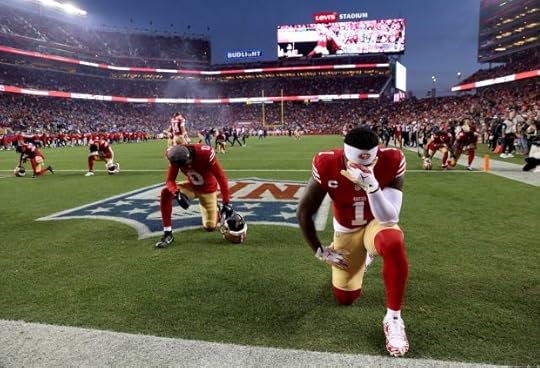 San Francisco 49ers' Deebo Samuel Sr. #1 and teammates take a knee before their NFL game against the Detroit Lions at Levis Stadium in Santa Clara, Calif., on Monday, Dec. 30, 2024. (Jane Tyska/Bay Area News Group)