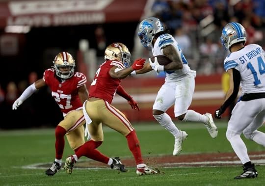 Detroit Lions' Jahmyr Gibbs #26 gains yardage as San Francisco 49ers' Deommodore Lenoir #2 defendsin the second quarter of their NFL game at Levis Stadium in Santa Clara, Calif., on Monday, Dec. 30, 2024. (Jane Tyska/Bay Area News Group)