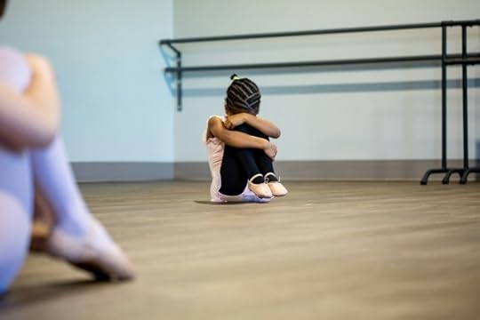 A child curled up, upset. Don’t let them win by making you negative.