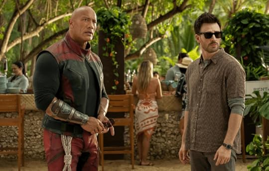 Dwayne Johnson & Chris Evans in a scene from 'Red One' 