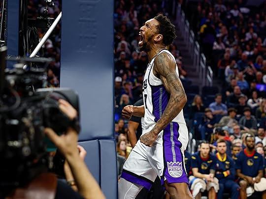 Sacramento Kings’ Malik Monk (0) celebrates his dunk against the...