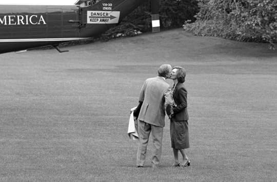 President Jimmy Carter pauses to kiss his wife, first lady Rosalynn Carter, as he boards a helicopter in Washington