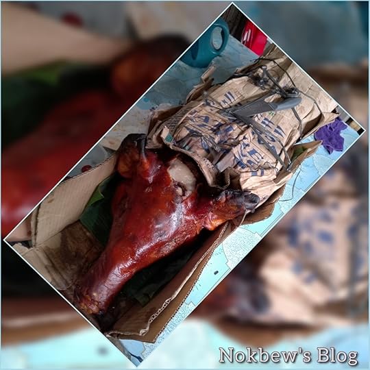 Original photography by Nokbew's Blog shows a grilled pig.