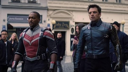 Sam Wilson (in his falcon costume) and Bucky Barnes look on in horror during the final moments of The Falcon and the Winter Soldier