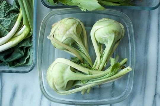 Three bulbs of kohlrabi in a glass bowl