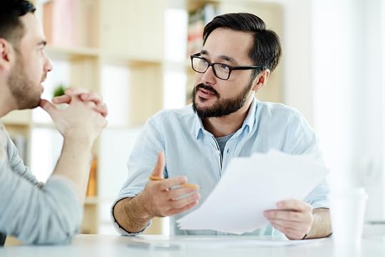Manager and employee speaking