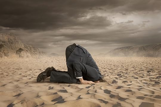 Manager with head in sand