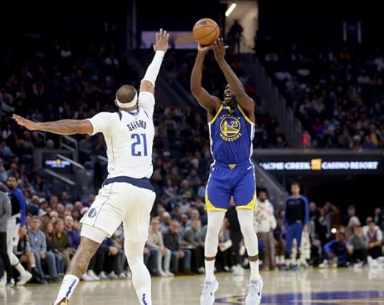 Golden State Warriors' Draymond Green #23 shoots a 3-point basket over Dallas Mavericks' Daniel Gafford #21 in the first half of their NBA game at the Chase Center in San Francisco, Calif., on Sunday, Dec. 15, 2024. (Jane Tyska/Bay Area News Group)