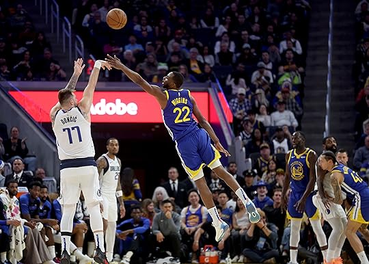 Golden State Warriors’ Andrew Wiggins #22 attempts to block a...