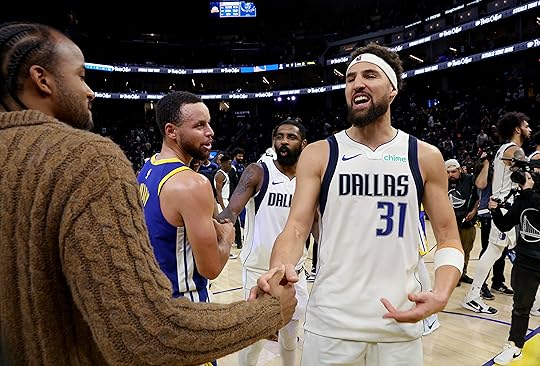 Dallas Mavericks’ Klay Thompson #31 is congratulated by Golden State...