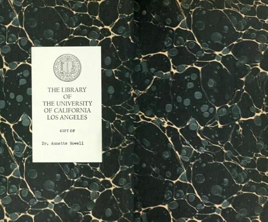 endpaper of an old book that is a collection of blue and green swirls with some lighter blue blobs. It has a bookplate from the library at the University of California in Los Angeles and a typewritten note says 