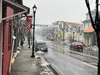 Strasburg, Virginia on a snowy winter day with a winter wonderland banner.