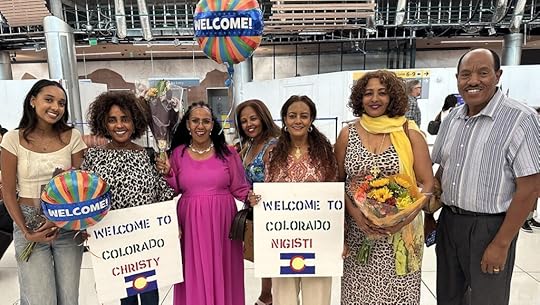 Group of people welcoming asylum seekers