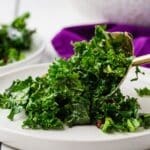 close up of kale salad on plate
