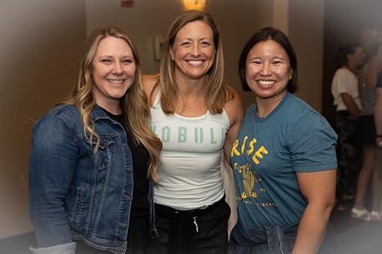 Three smiling gym owners pose for a photo at the Two-Brain Summit.