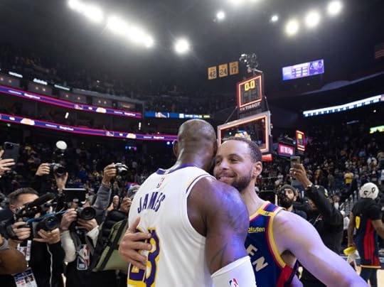 Golden State Warriors' Stephen Curry and Los Angeles Lakers' LeBron James share a hug after their game, Saturday, Jan. 25, 2025, at Chase Center in San Francisco, Calif. (Karl Mondon/Bay Area News Group)