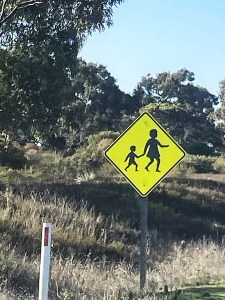 Yankees driving in Australia were surprised to school signs so far from schools.