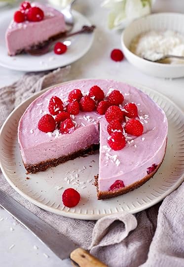 no-bake raspberry cheesecake with a slice cut out