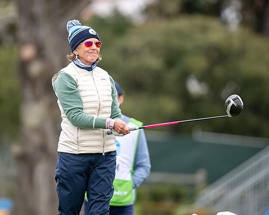 Mary Meeker, venture capitalist, reacts to her shot after teeing...