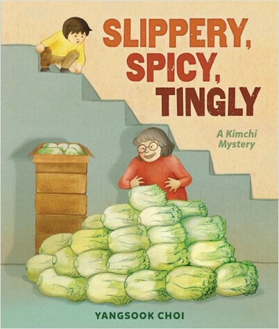 A young boy, squatting, peers over the side of a basement staircase. At the bottom is a woman with short, gray hair standing behind a pile of cabbage that goes up to her waist. More cabbages are in piled boxes to her side.