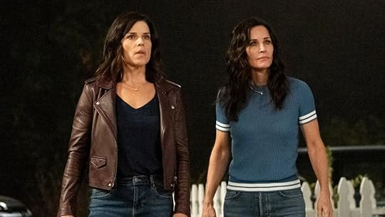 courteney cox and neve campbell stand beside each other in scream 6