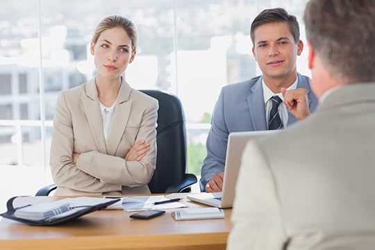 Person in a meeting looking annoyed