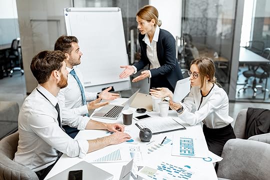 Team having a disagreement around a table