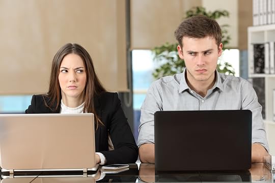 Coworkers looking at each other