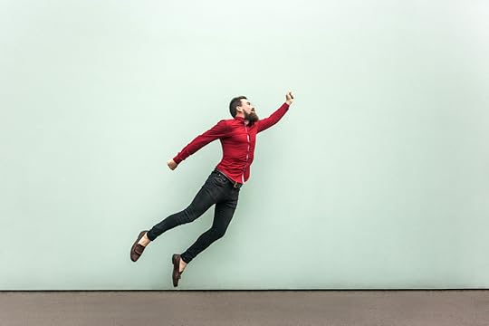 Business person pretending to fly