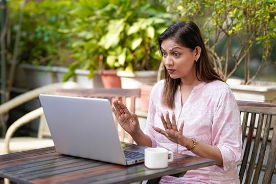 Woman working remotely and saying