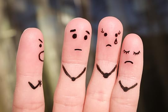 Fingers with faces showing different emotions