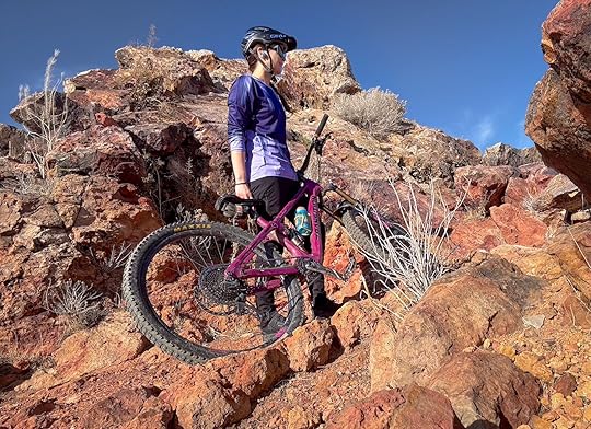 mountain biker in dharco jersey on trail
