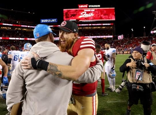 San Francisco 49ers' George Kittle #85 congratulates a Detroit Lions coach after the Lions 40-34 NFL win at Levis Stadium in Santa Clara, Calif., on Monday, Dec. 30, 2024. (Jane Tyska/Bay Area News Group)